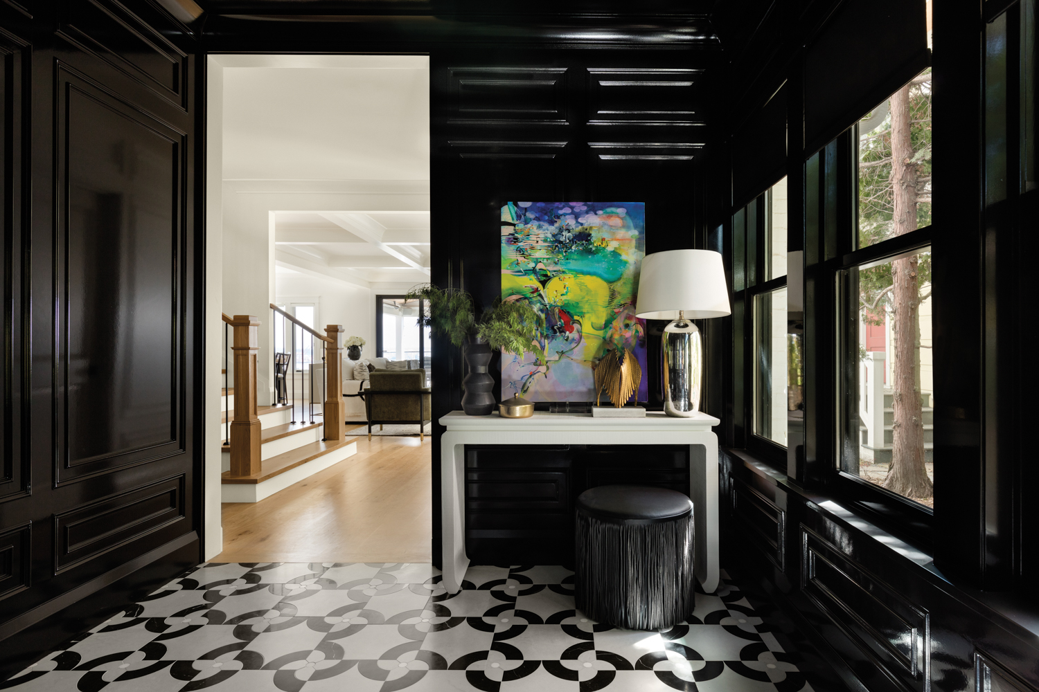 foyer with glossy black walls,...