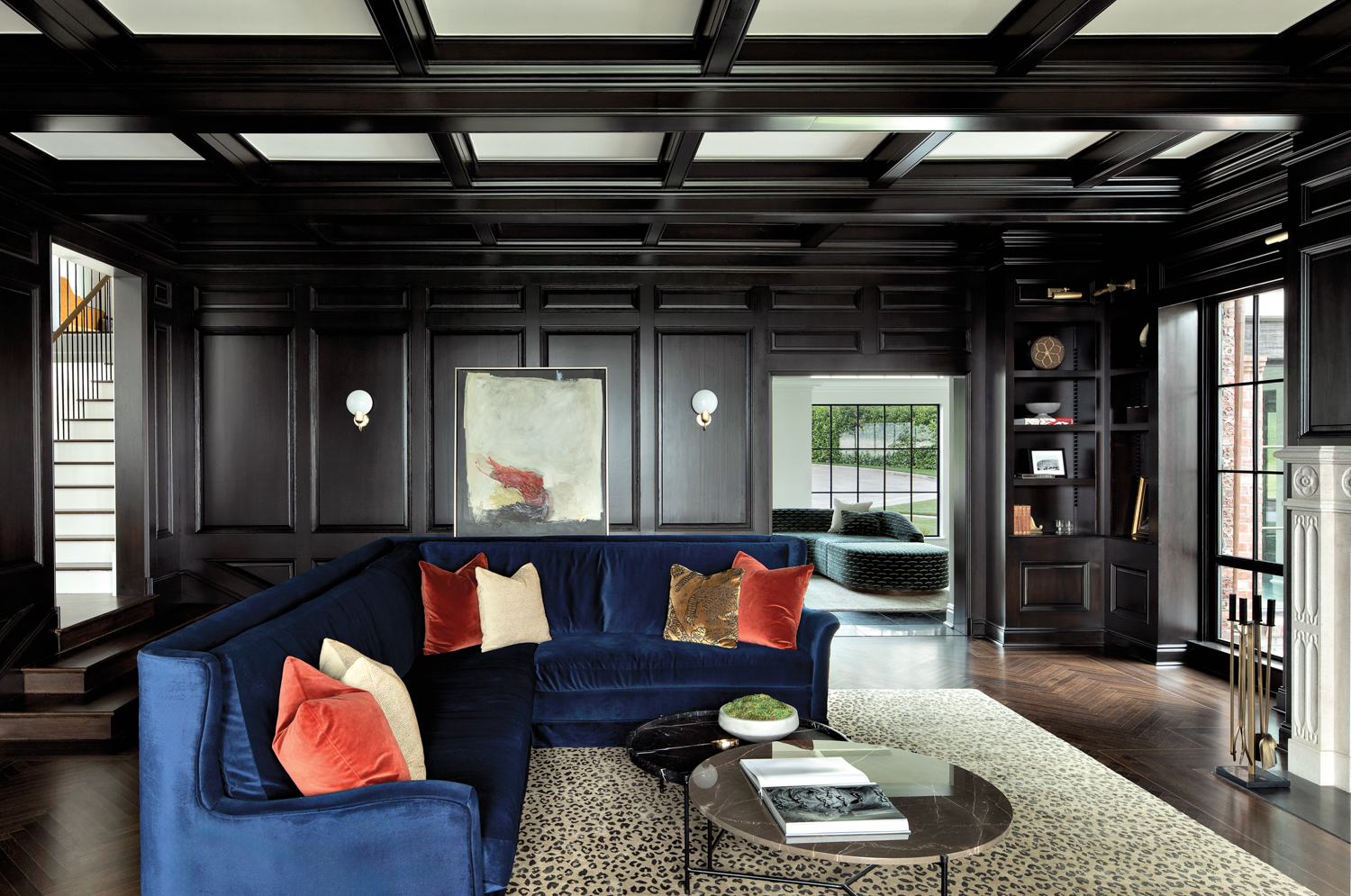 Living room with dark paneling...