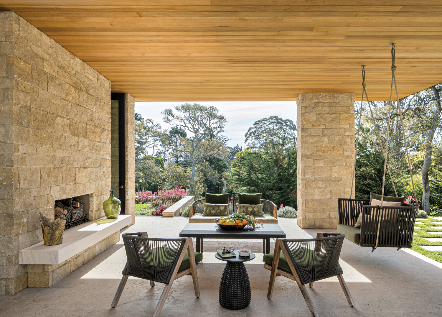 A shaded outdoor patio has...