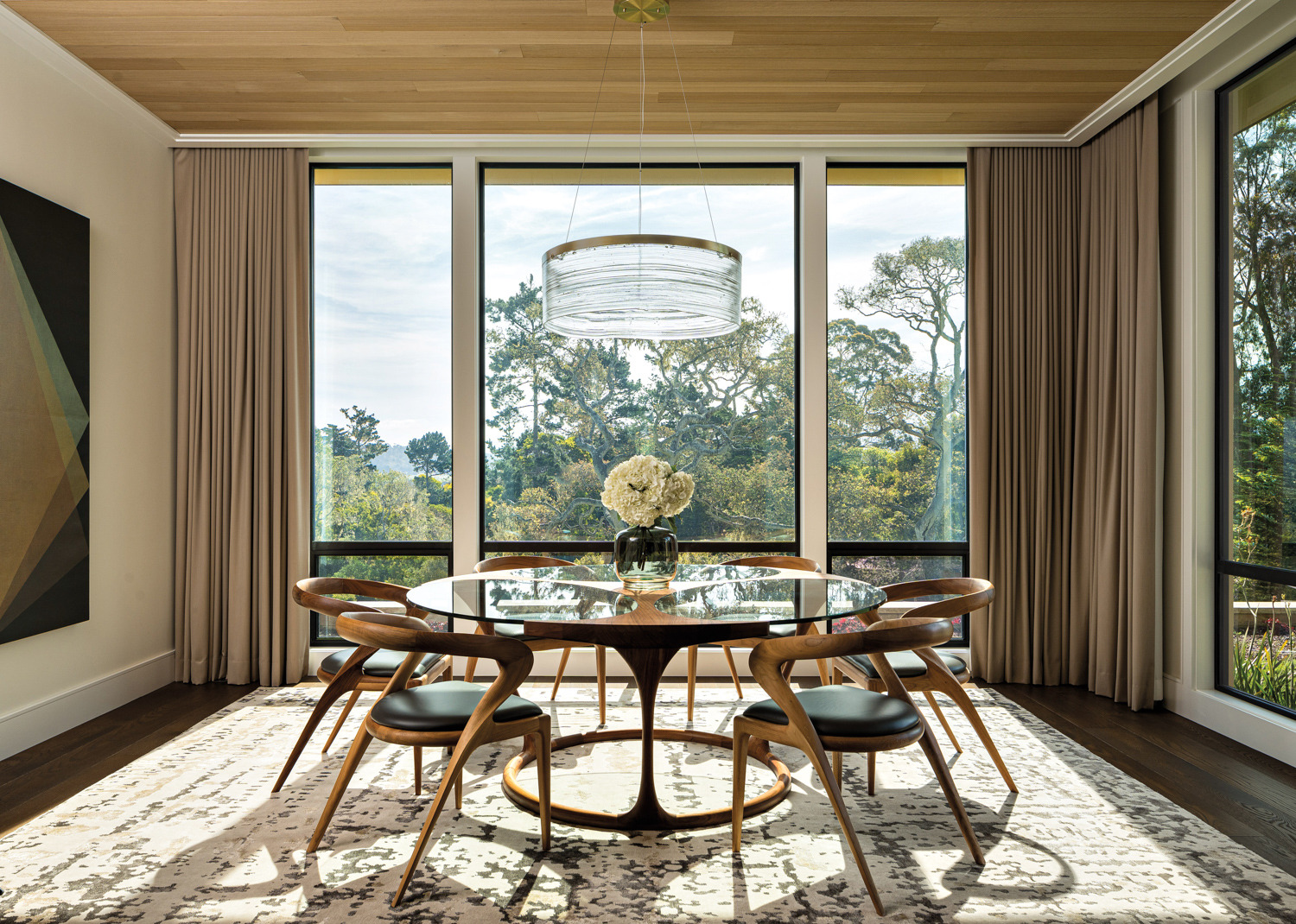 dining room with glass-topped table,...