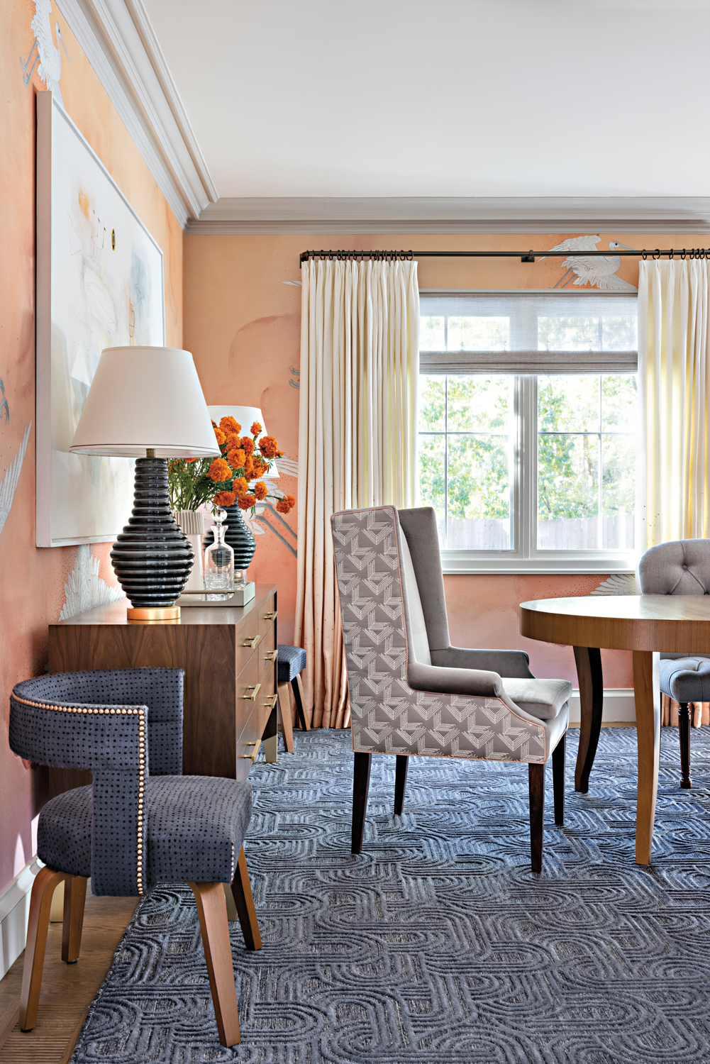 dining room with peach walls,...