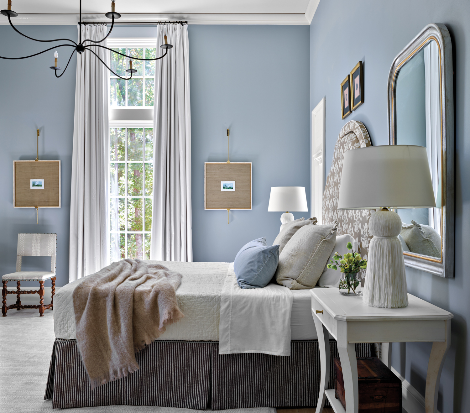 Elegant bedroom with calming blue...