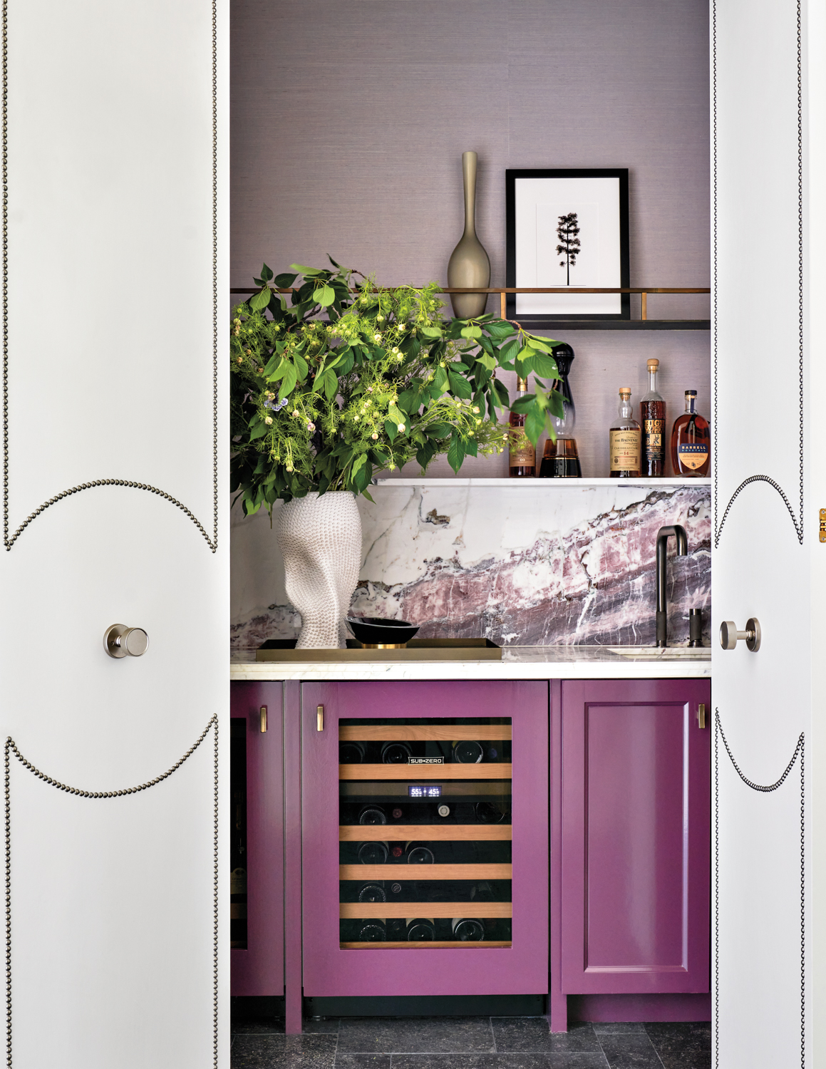 bar area with purple cabinetry...