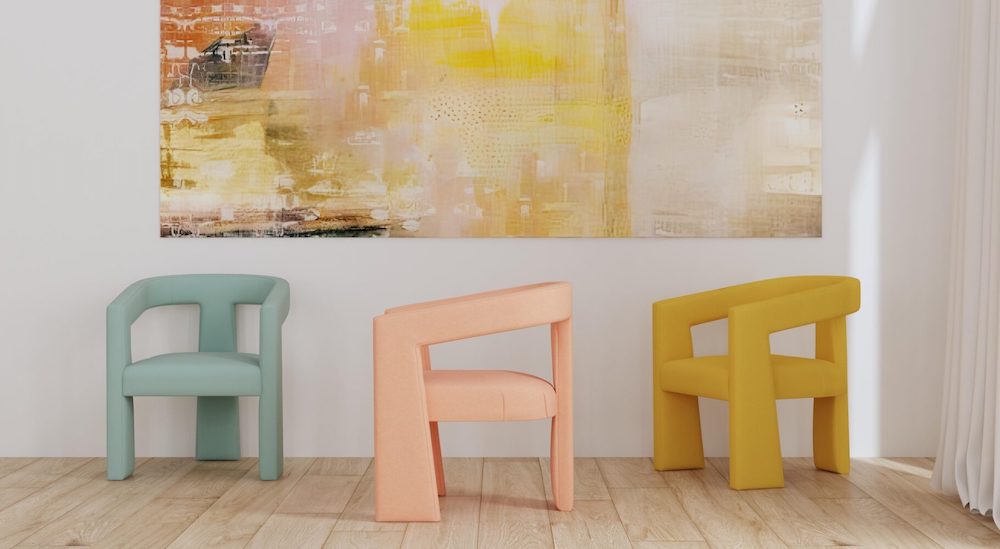 thee modern chairs with contemporary painting in pastel colors