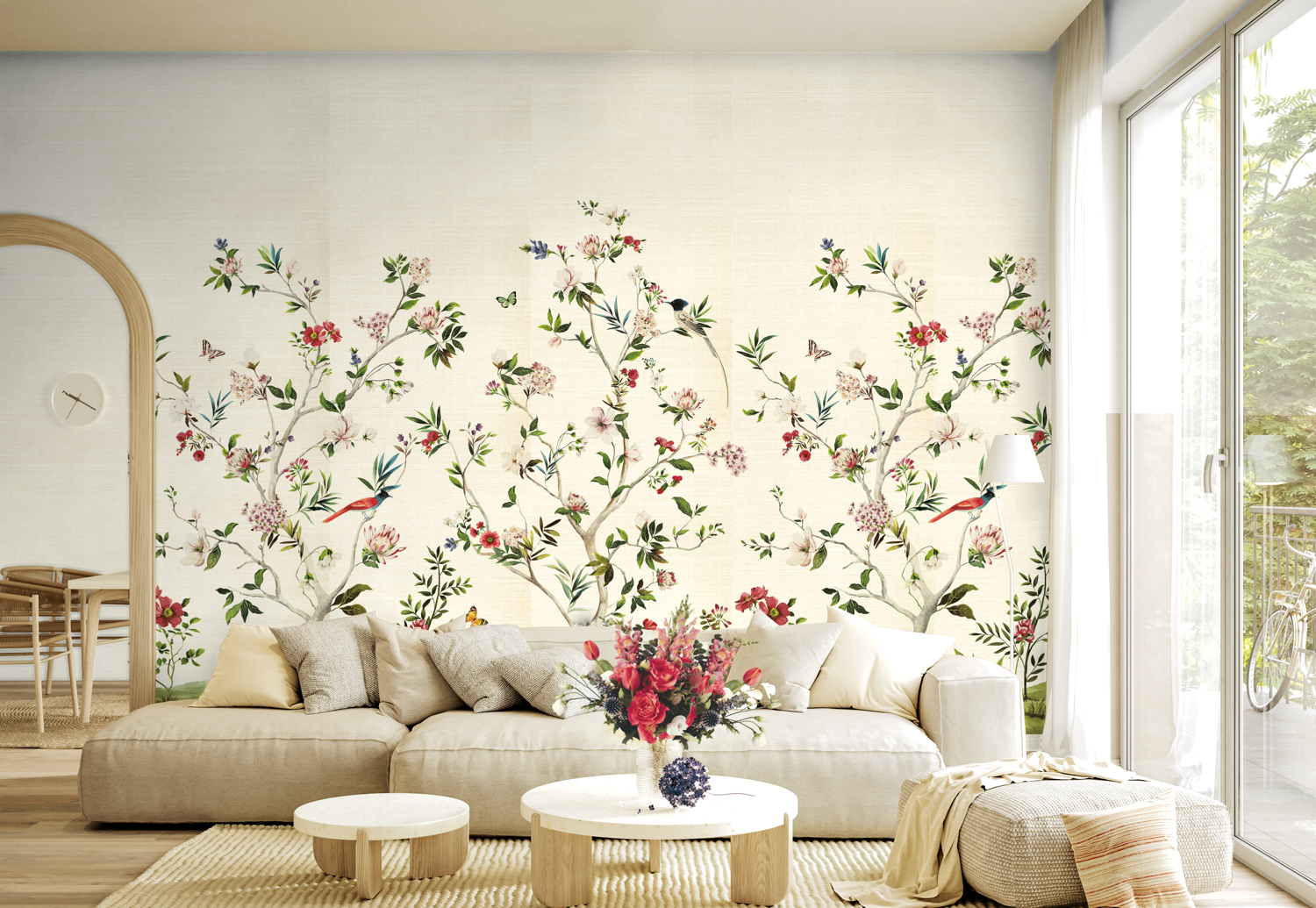 Full wall-to-wall floral wallpaper in a living space with a low-profile cream sofa and round coffee tables
