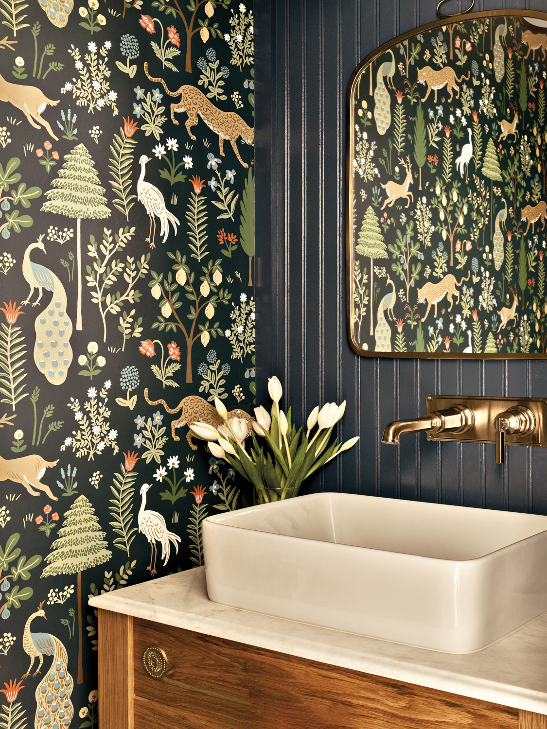 powder room with patterned wallpaper...