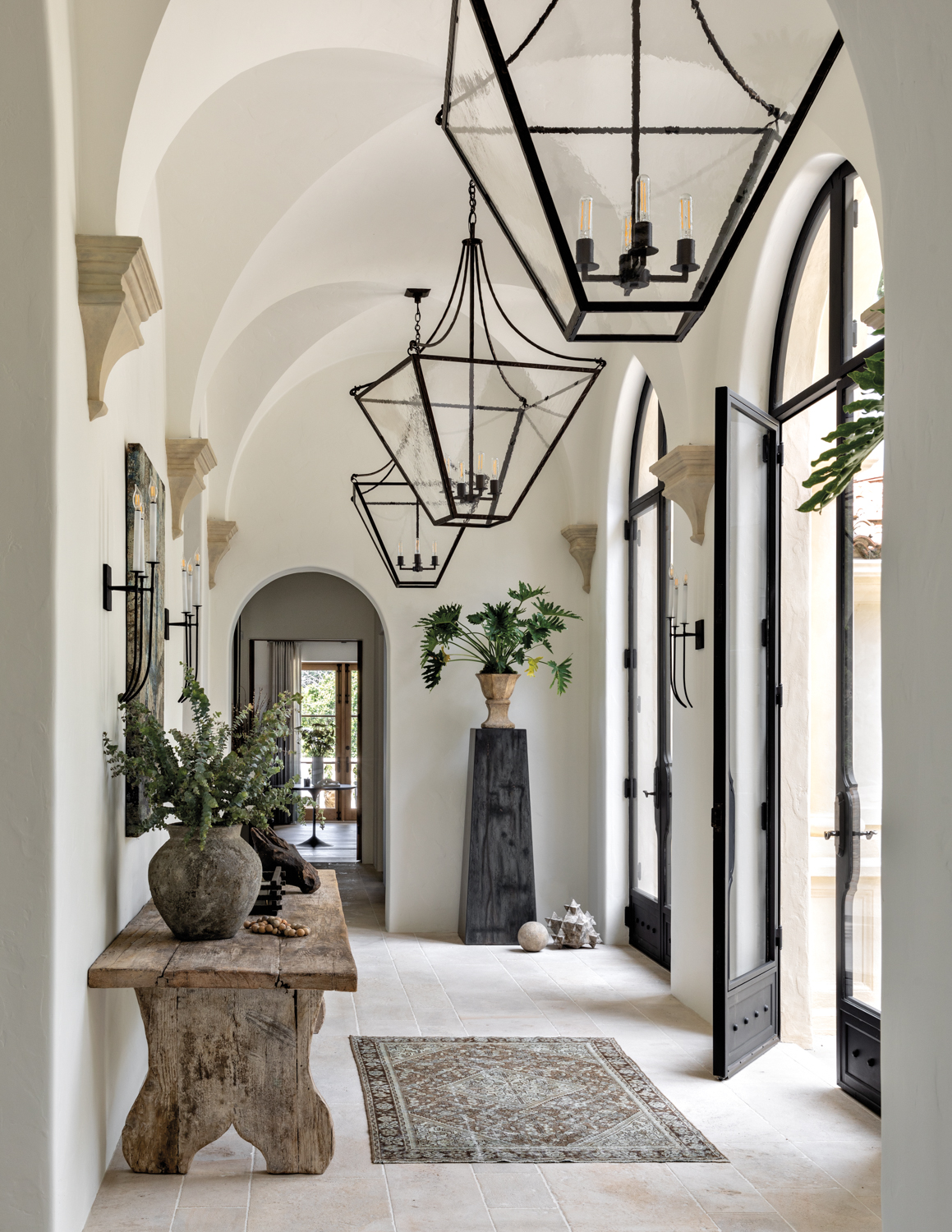 Entrance hall with arched doorways,...