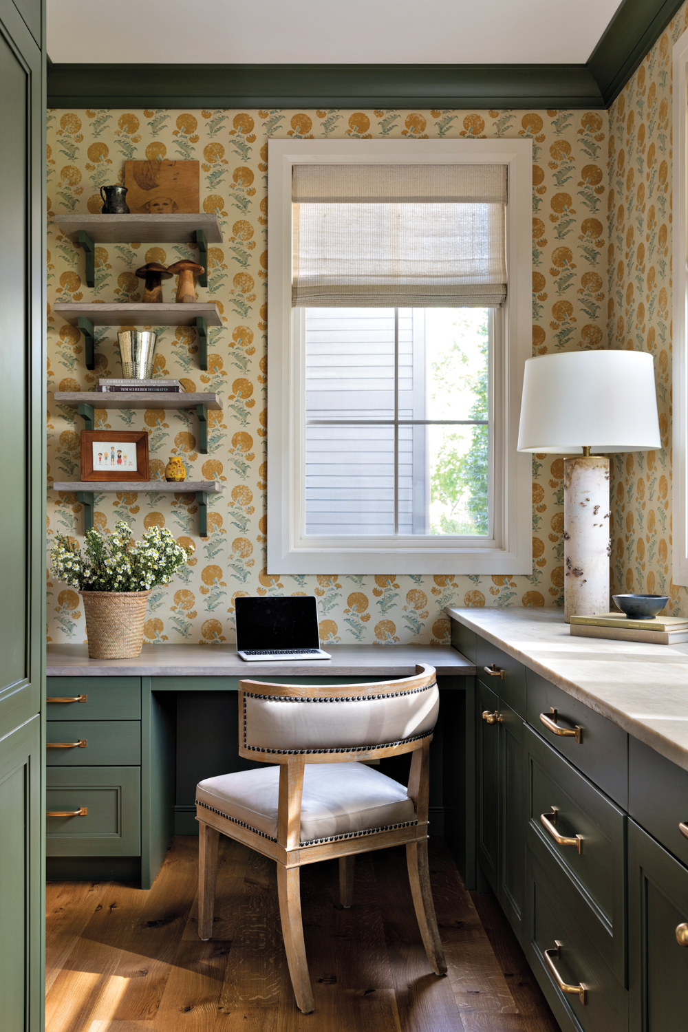 A home office with yellow-and-green...