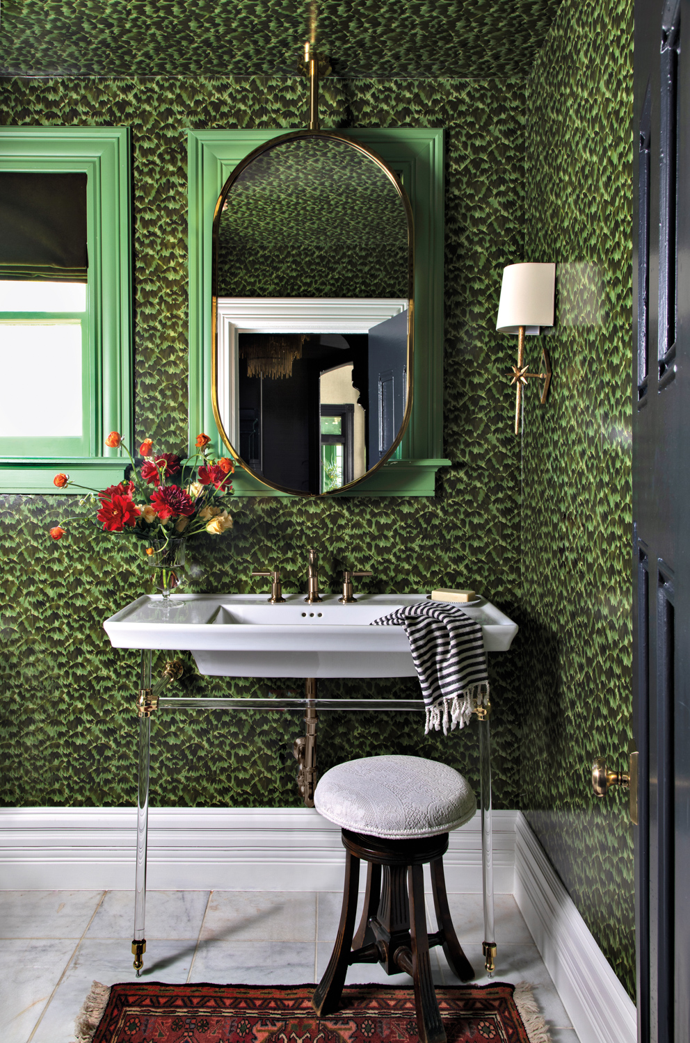 A powder room with a...