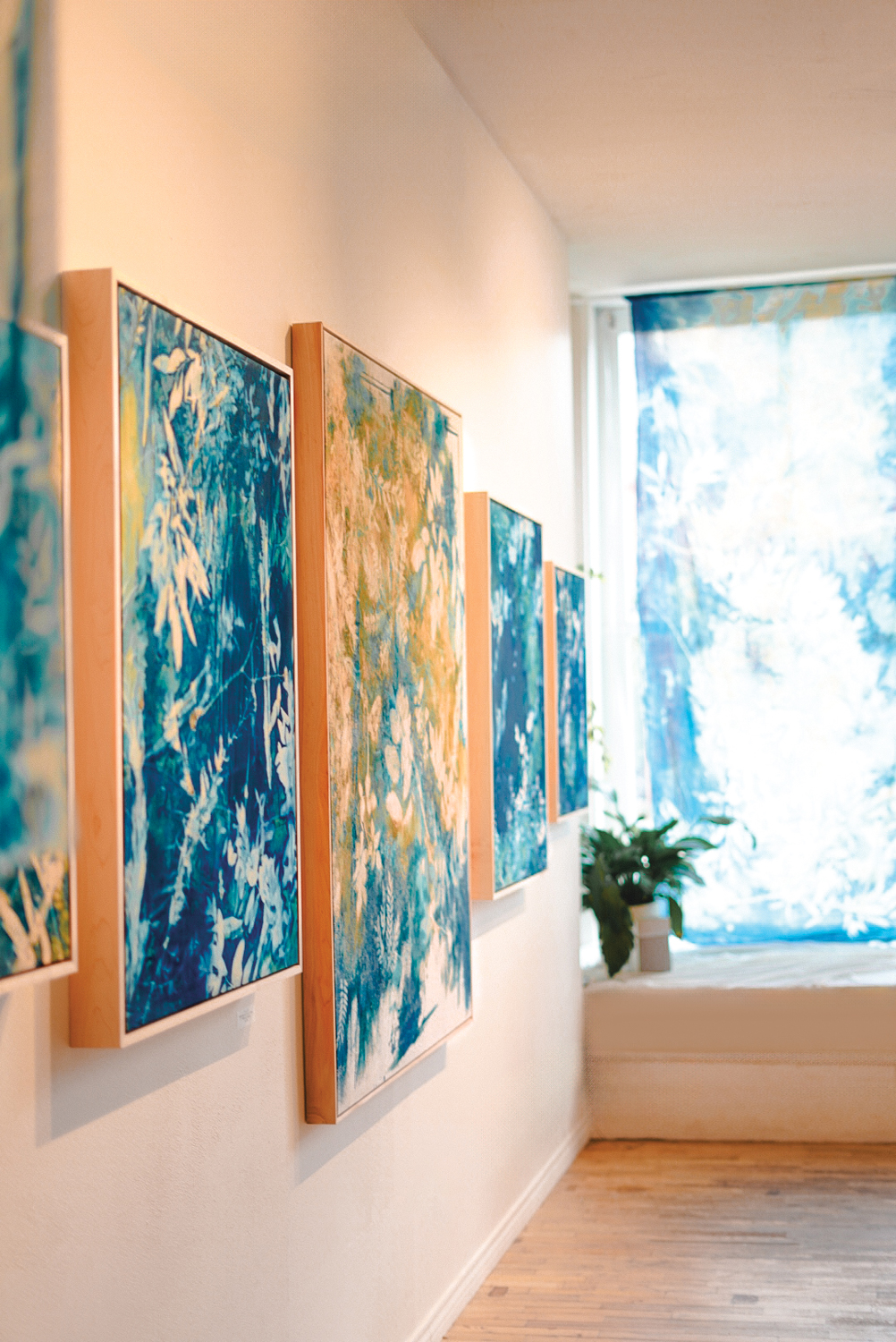 artworks by Kristen Abbott on display on a gallery wall