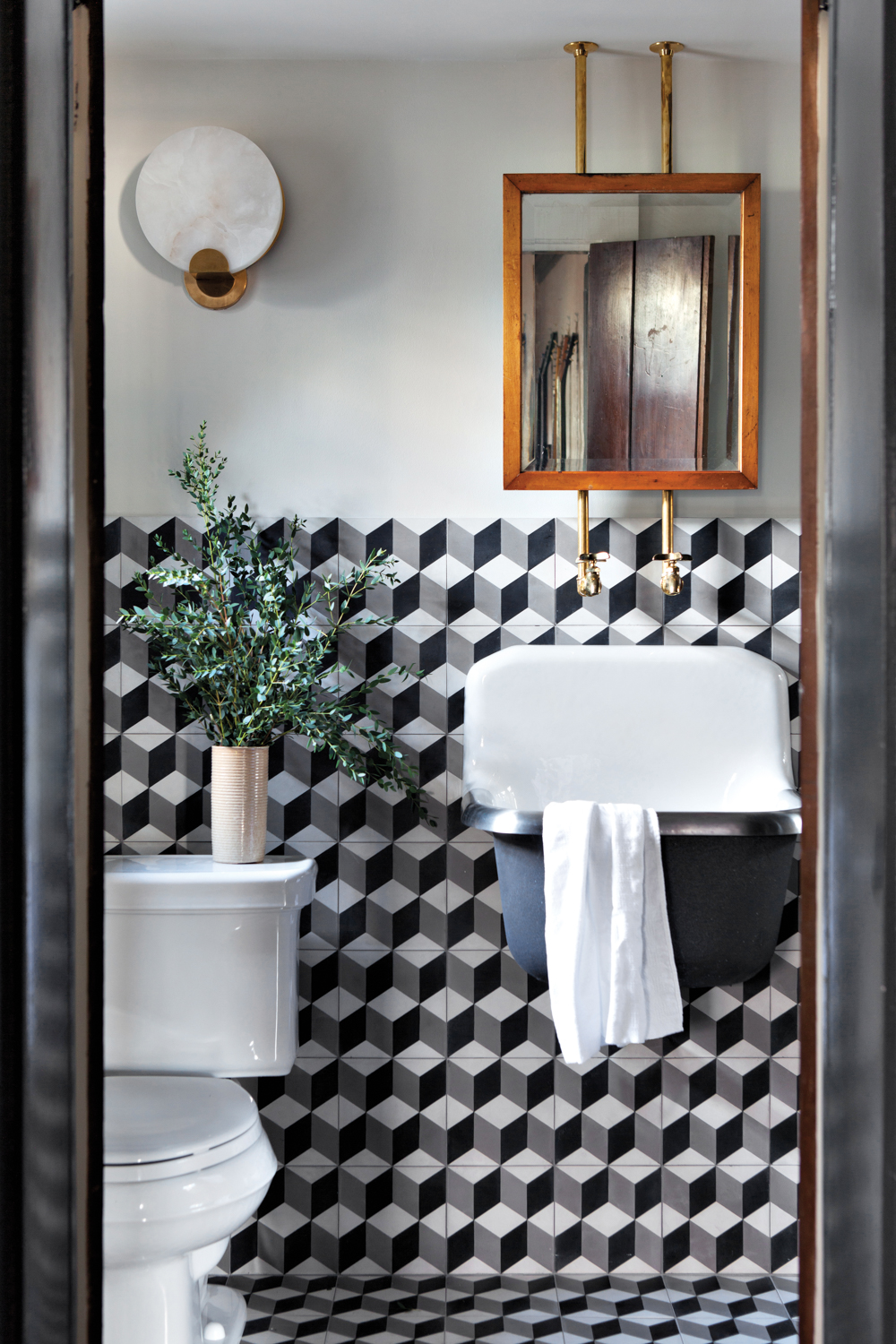Powder room with checkered tile backsplash by Benjamin Vandiver