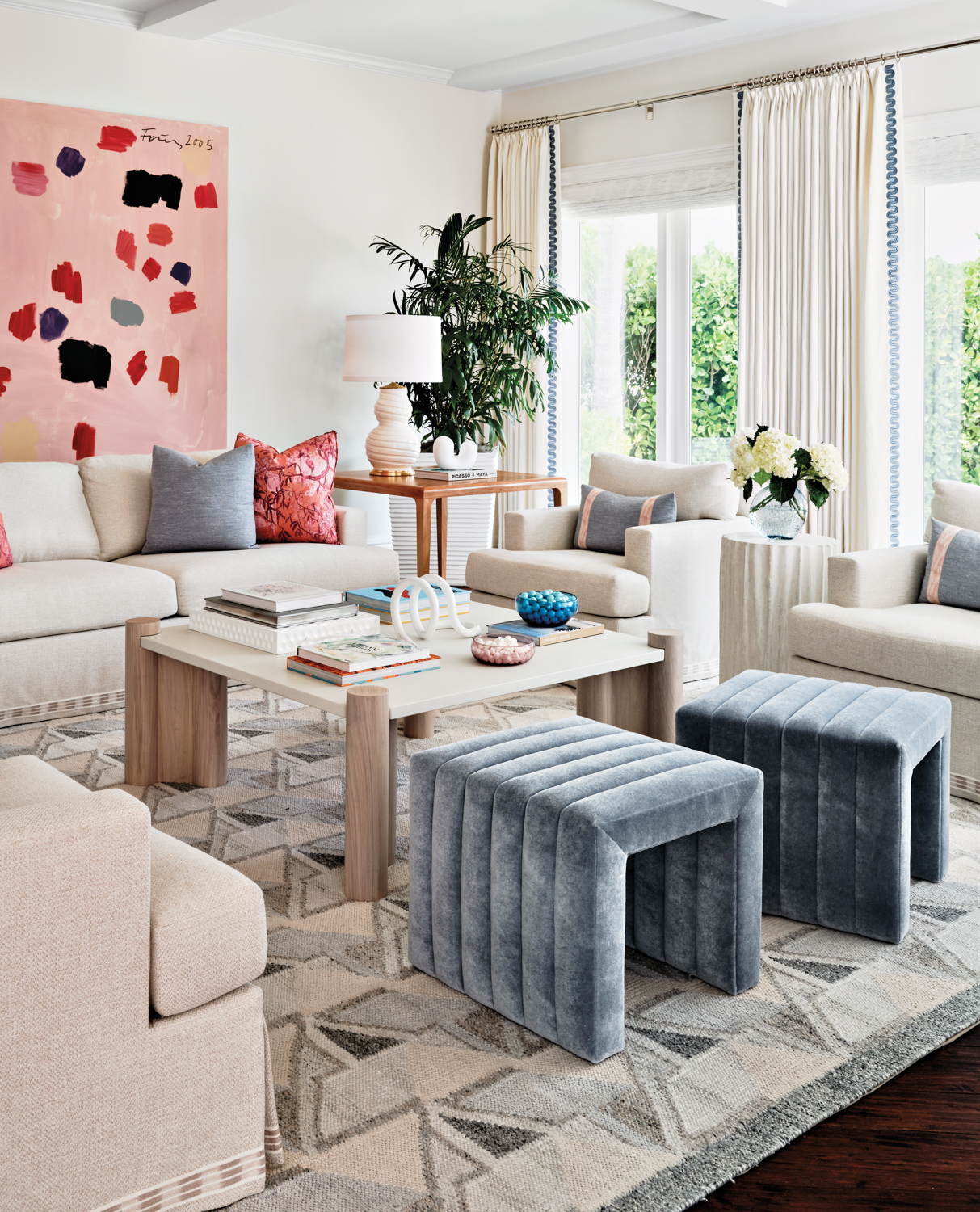 family room with cream-colored furnishings,...