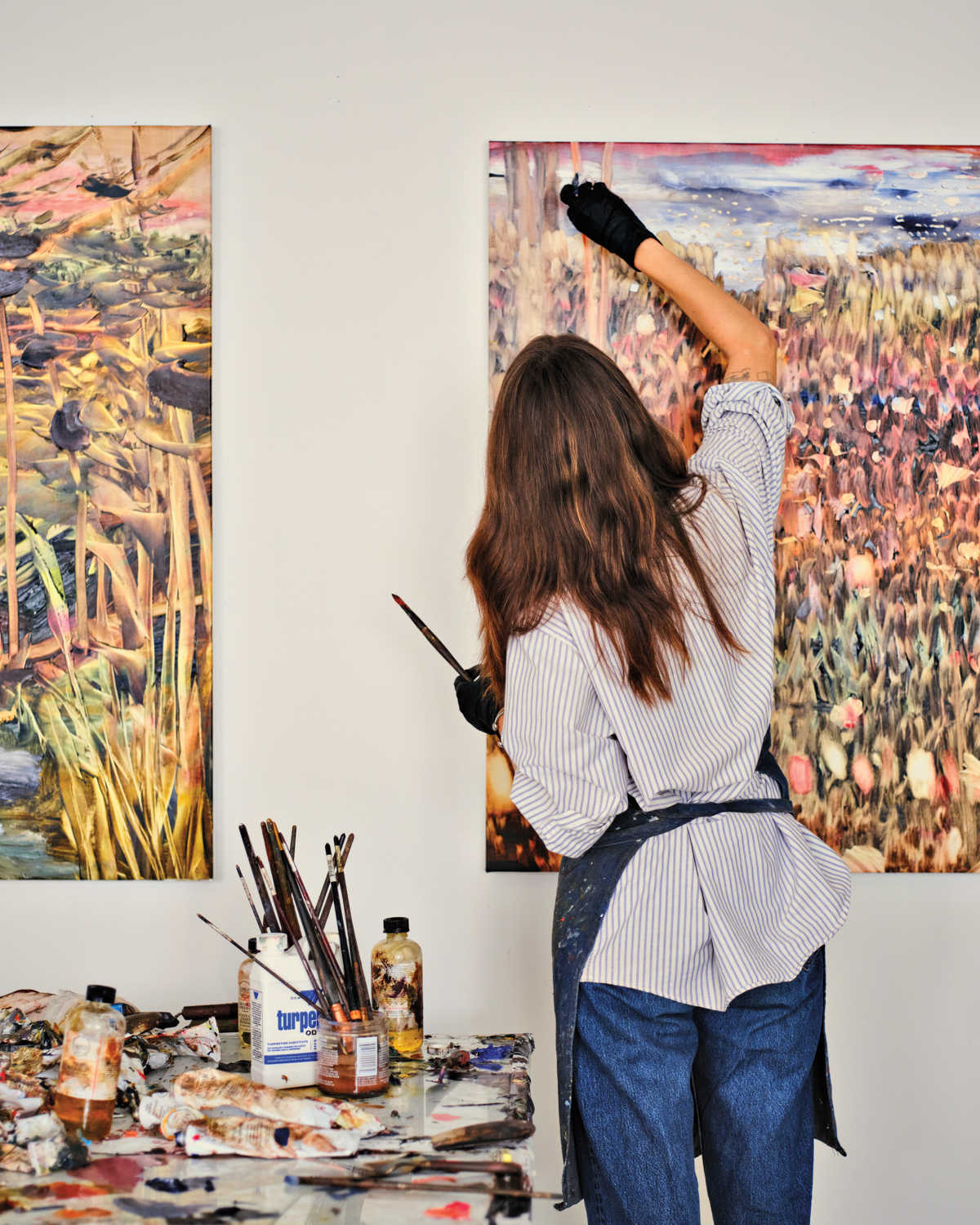Painter Madeline Peckenpaugh working in her Queens studio