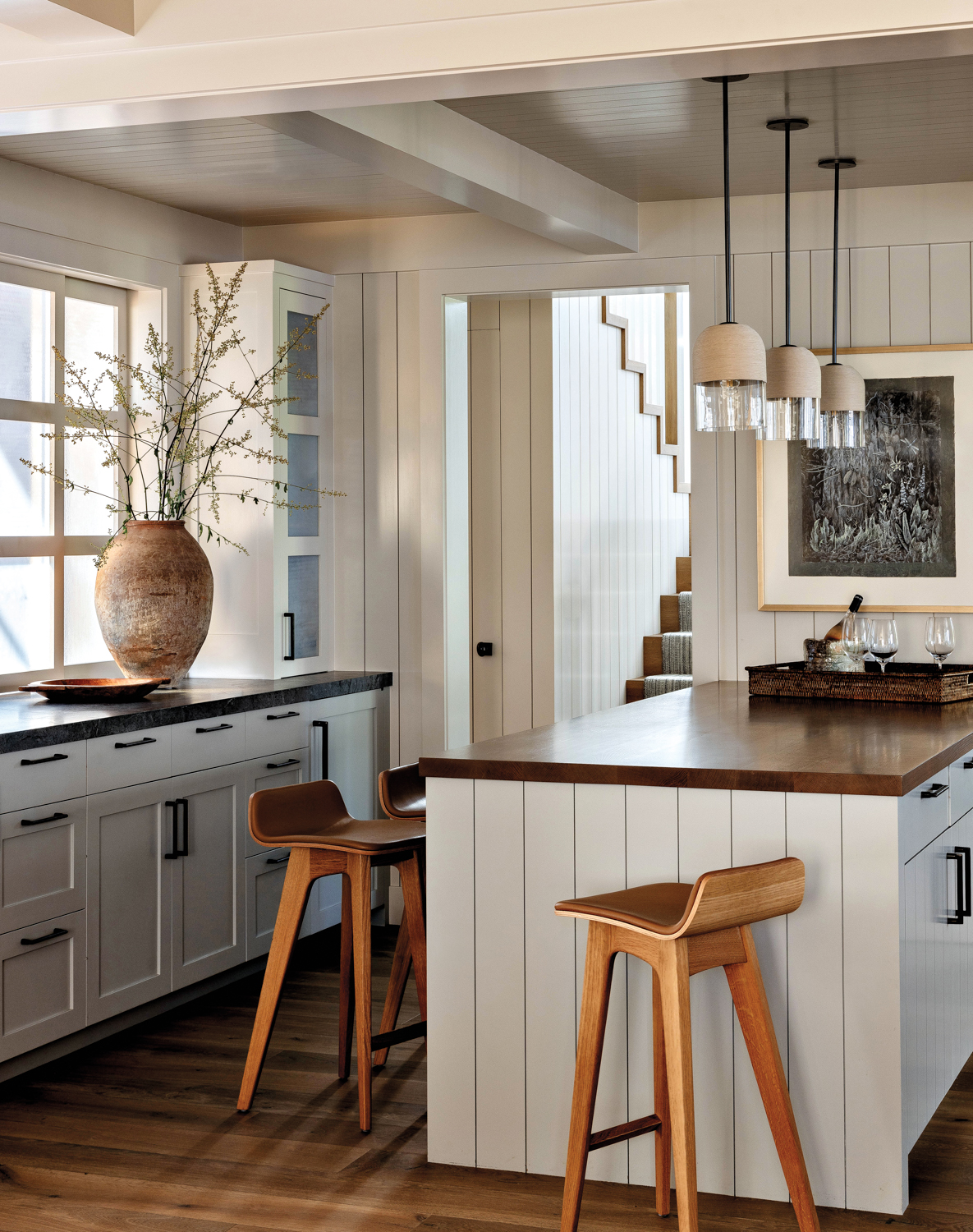 A kitchen with a central...