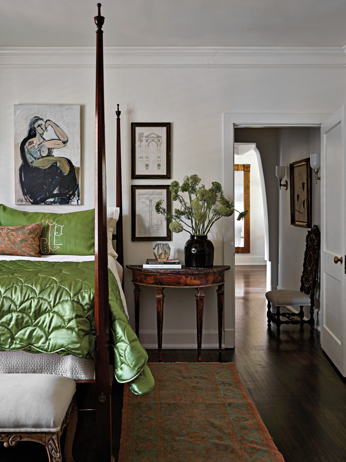Bedroom with green silk bedding...