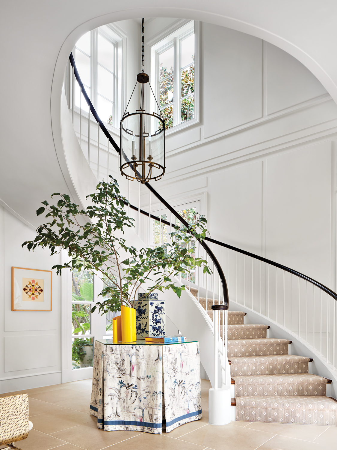 A foyer with a spiral...
