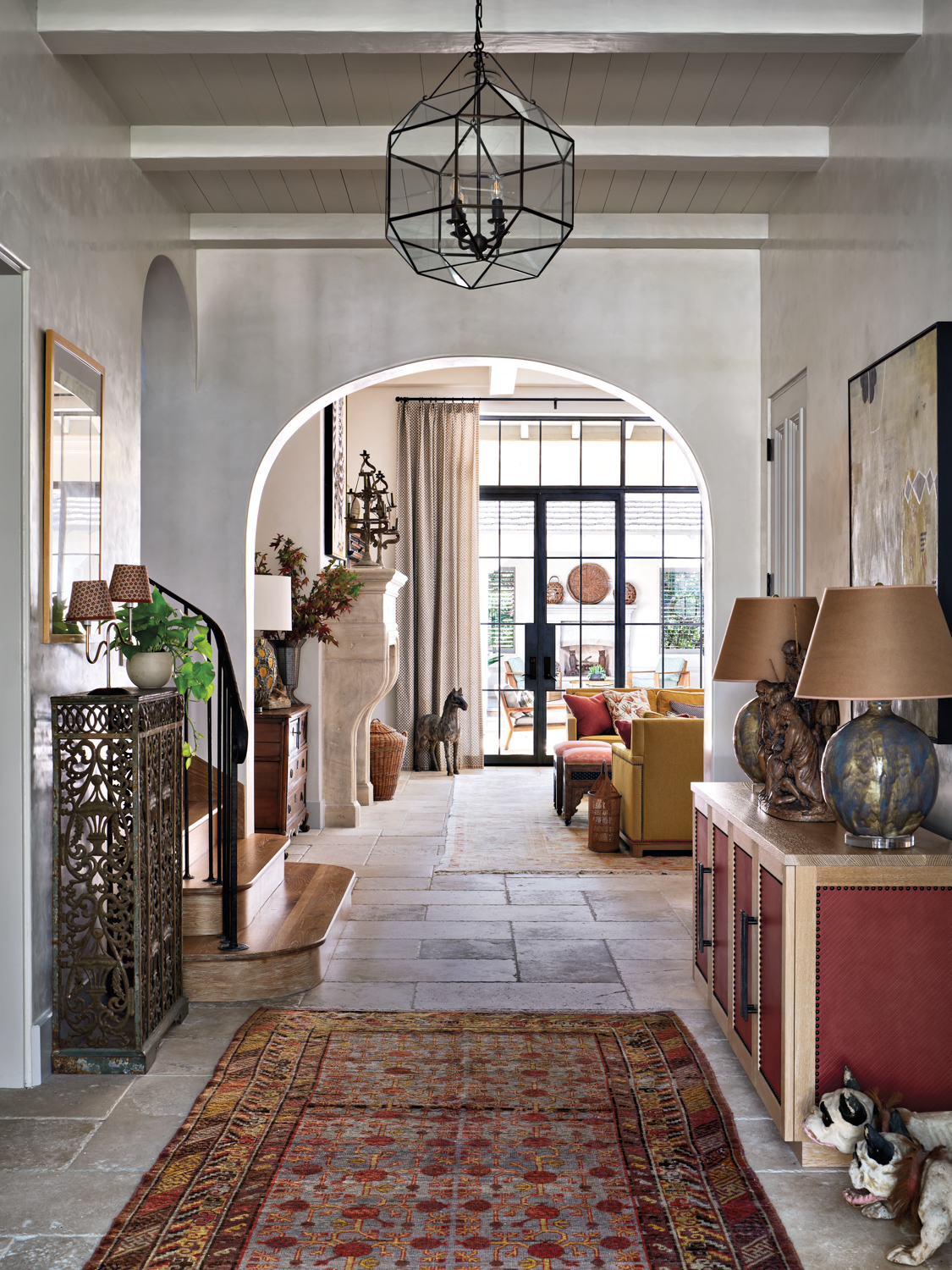 Entry featuring eclectic furnishings like...