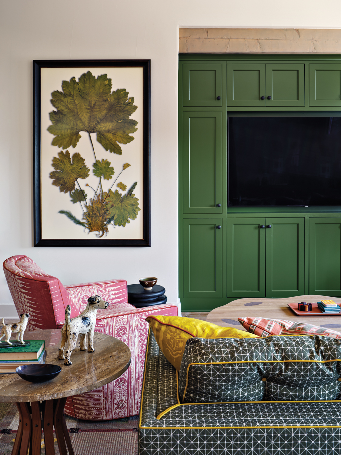 Game room with green cabinetry,...