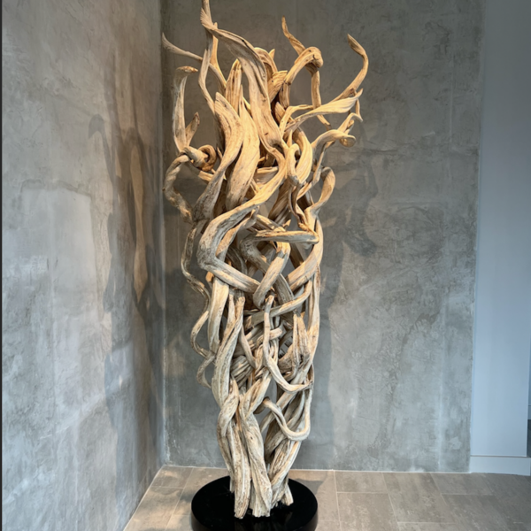 Uplit light wood handmade sculpture.