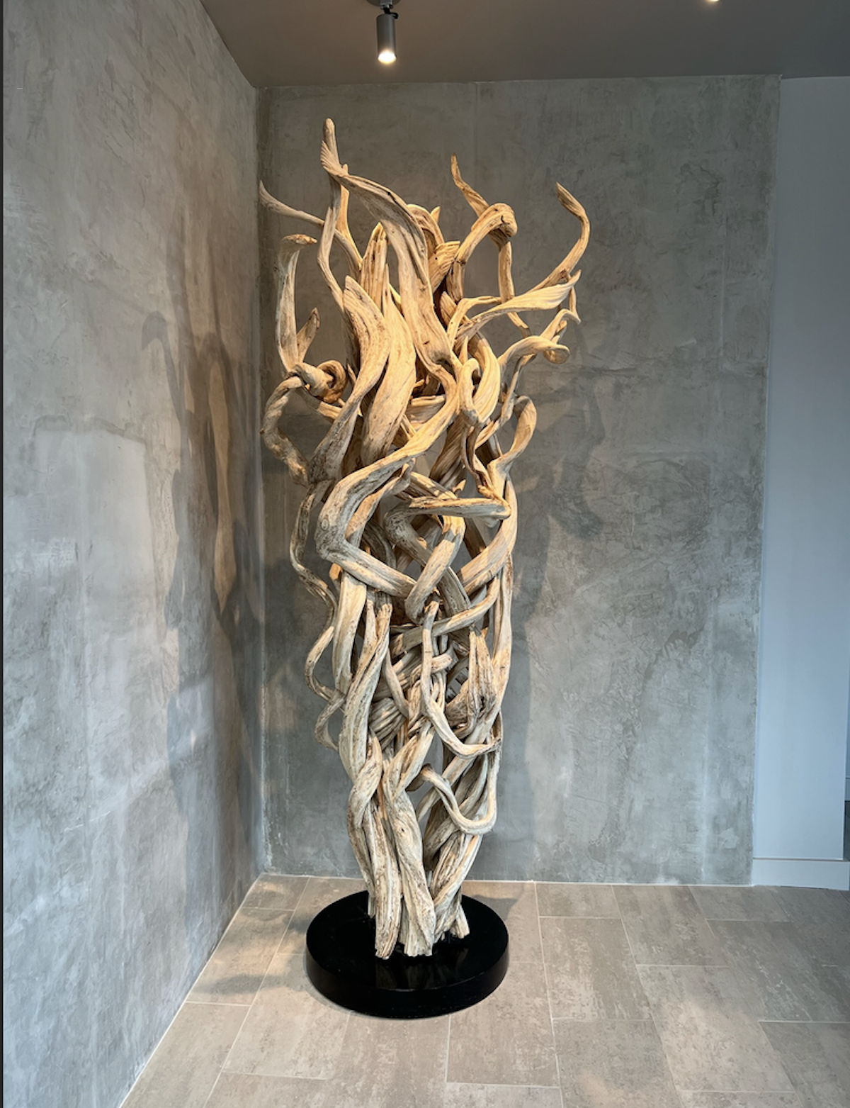 Uplit light wood handmade sculpture.
