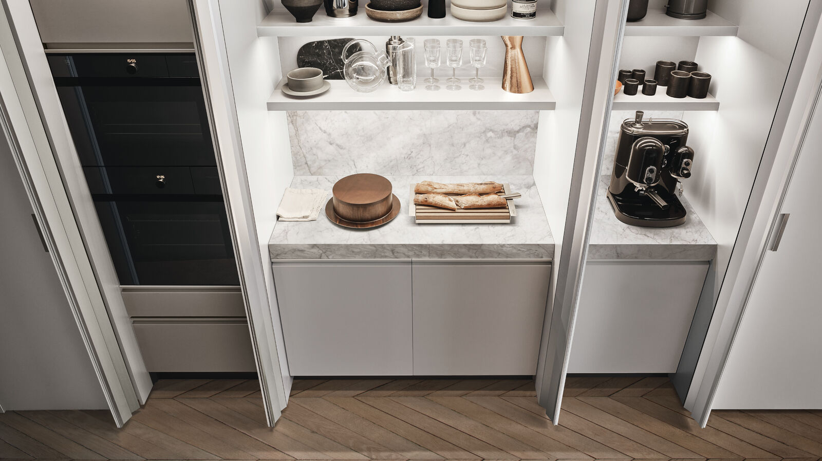 Modern kitchen featuring white cabinets.