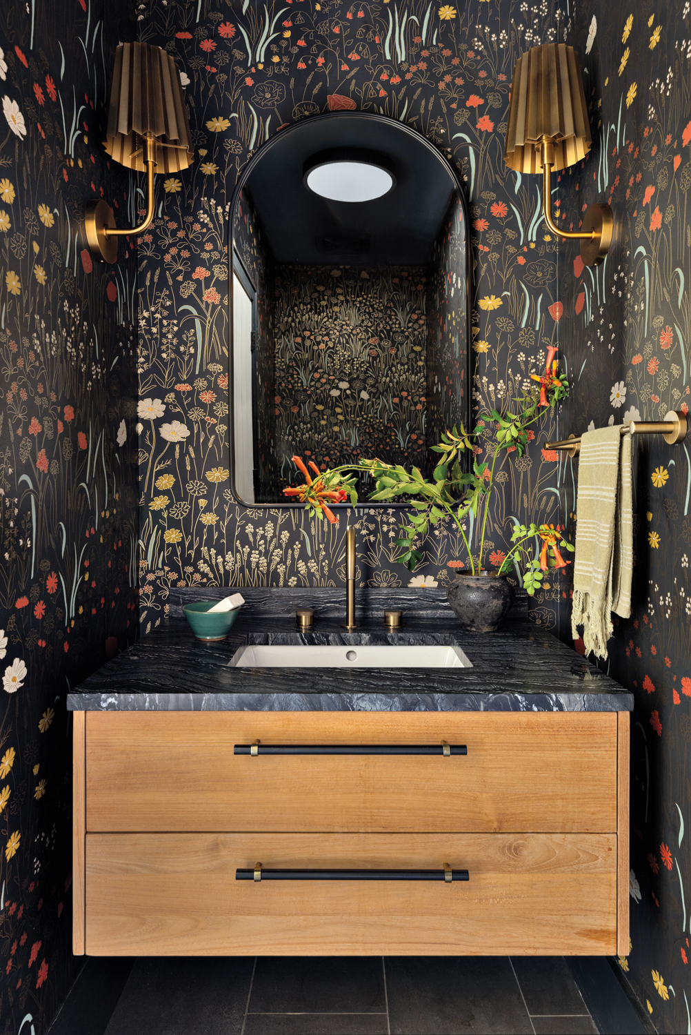 powder room with black-gold-and-orange floral...