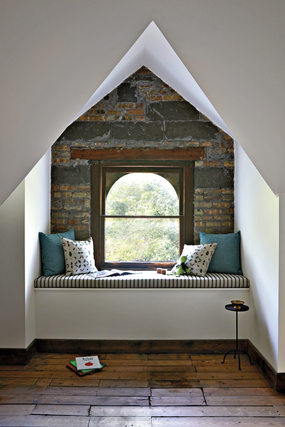 built-in window seat with exposed...
