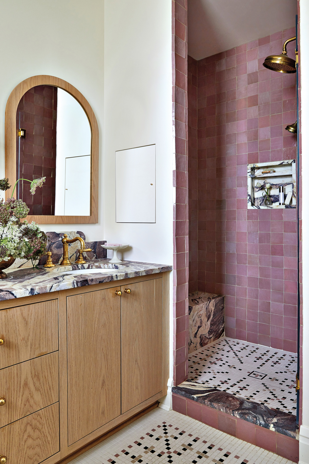 bathroom with purple-veined marble countertop...