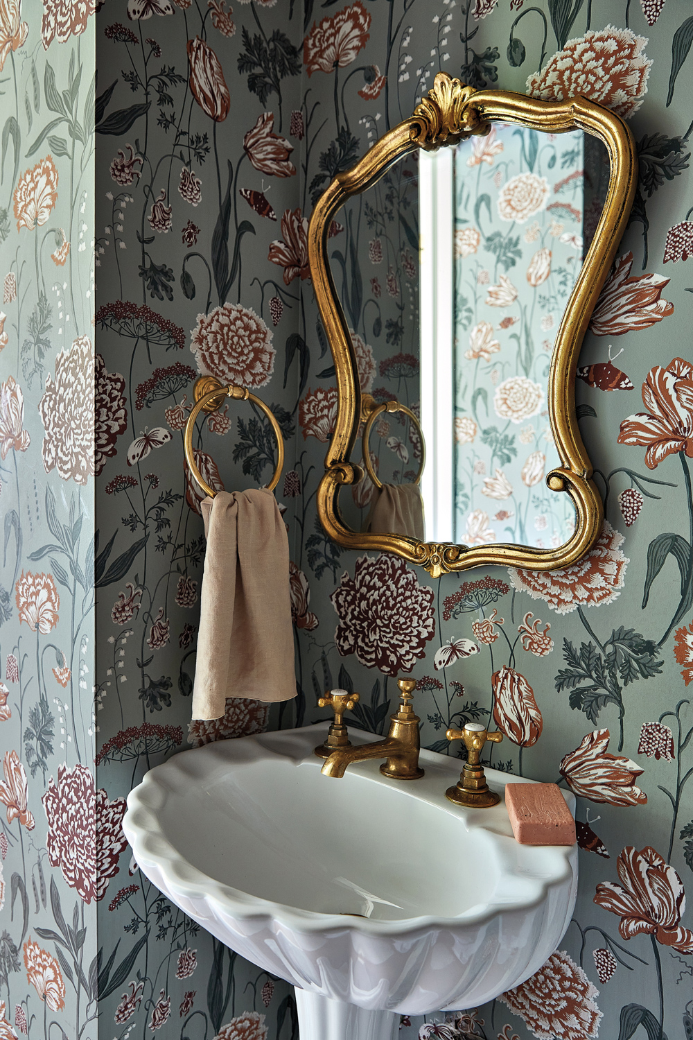 powder room with green-and-orange floral...