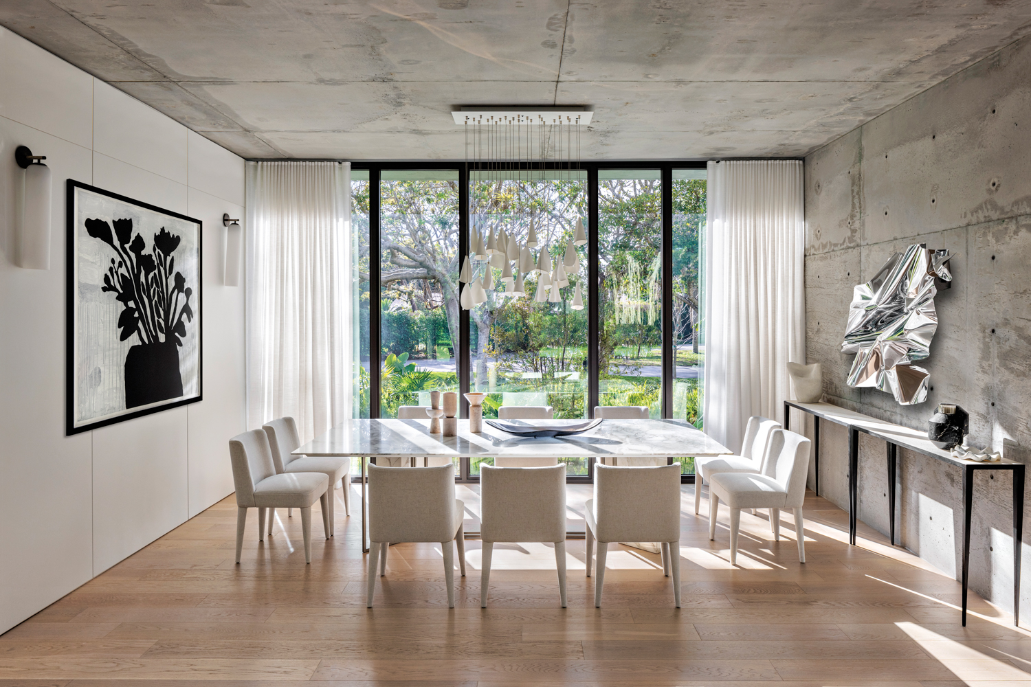 dining area with black-and-white artwork,...
