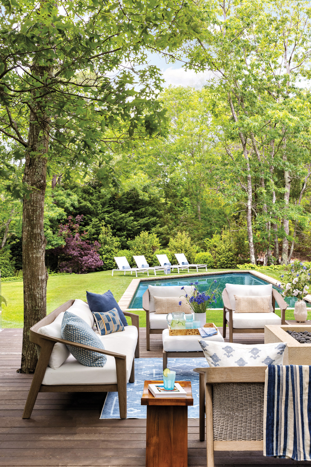 outdoor lounge area with blue...