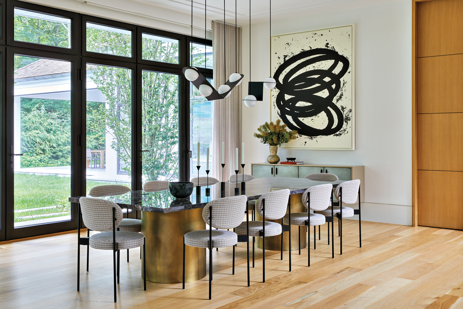 modern dining room with large...