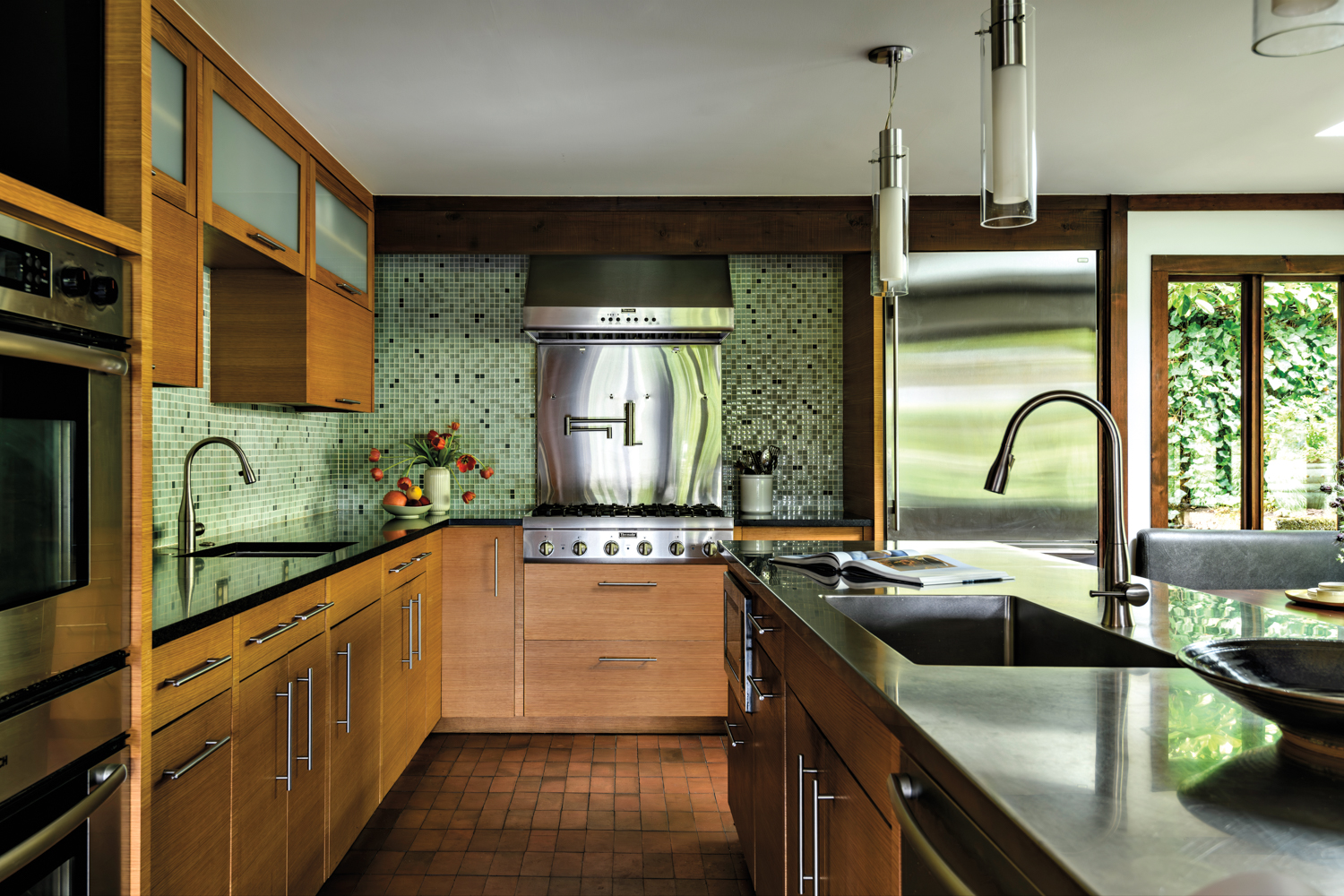 kitchen with a green tile...