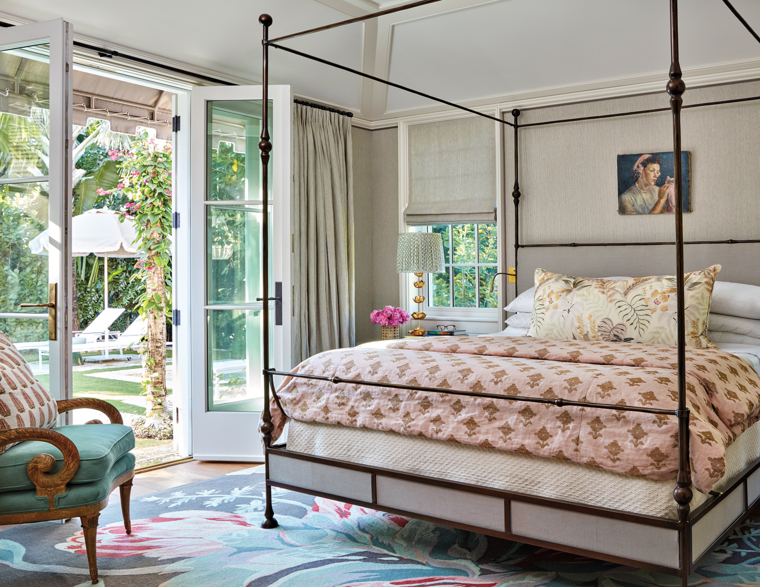 sunny bedroom with floral-print rug,...