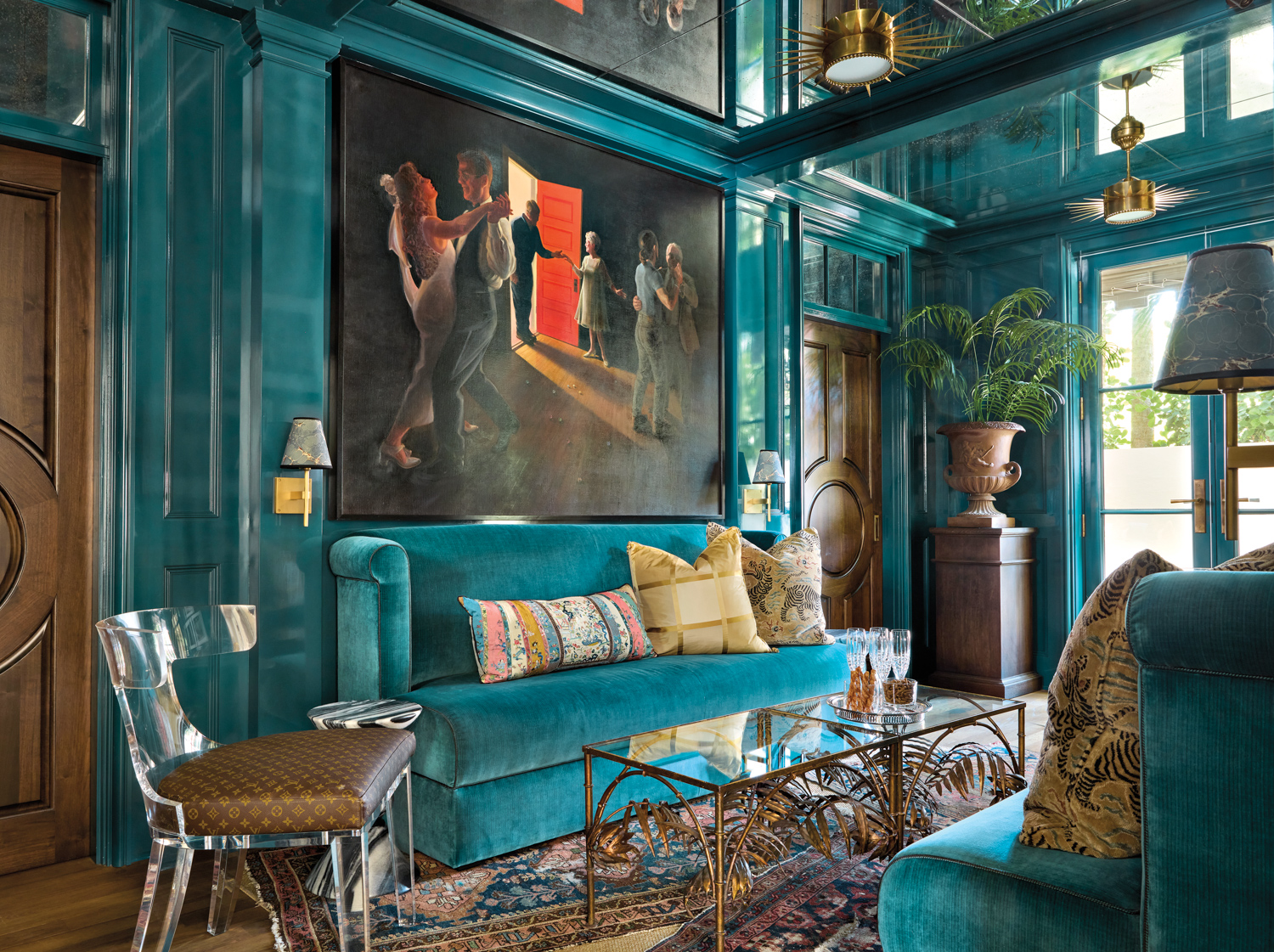 teal-colored cocktail lounge with large...