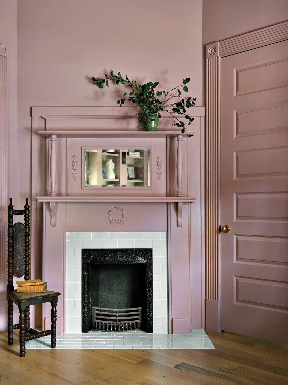 A vintage fireplace, door, millwork...