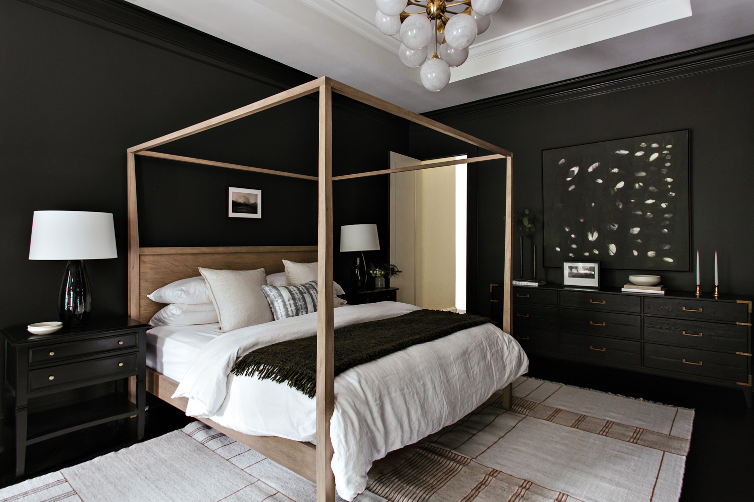 Dark bedroom with light-colored wood...