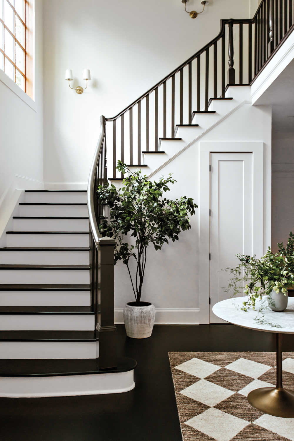 Entry stair hall with white...