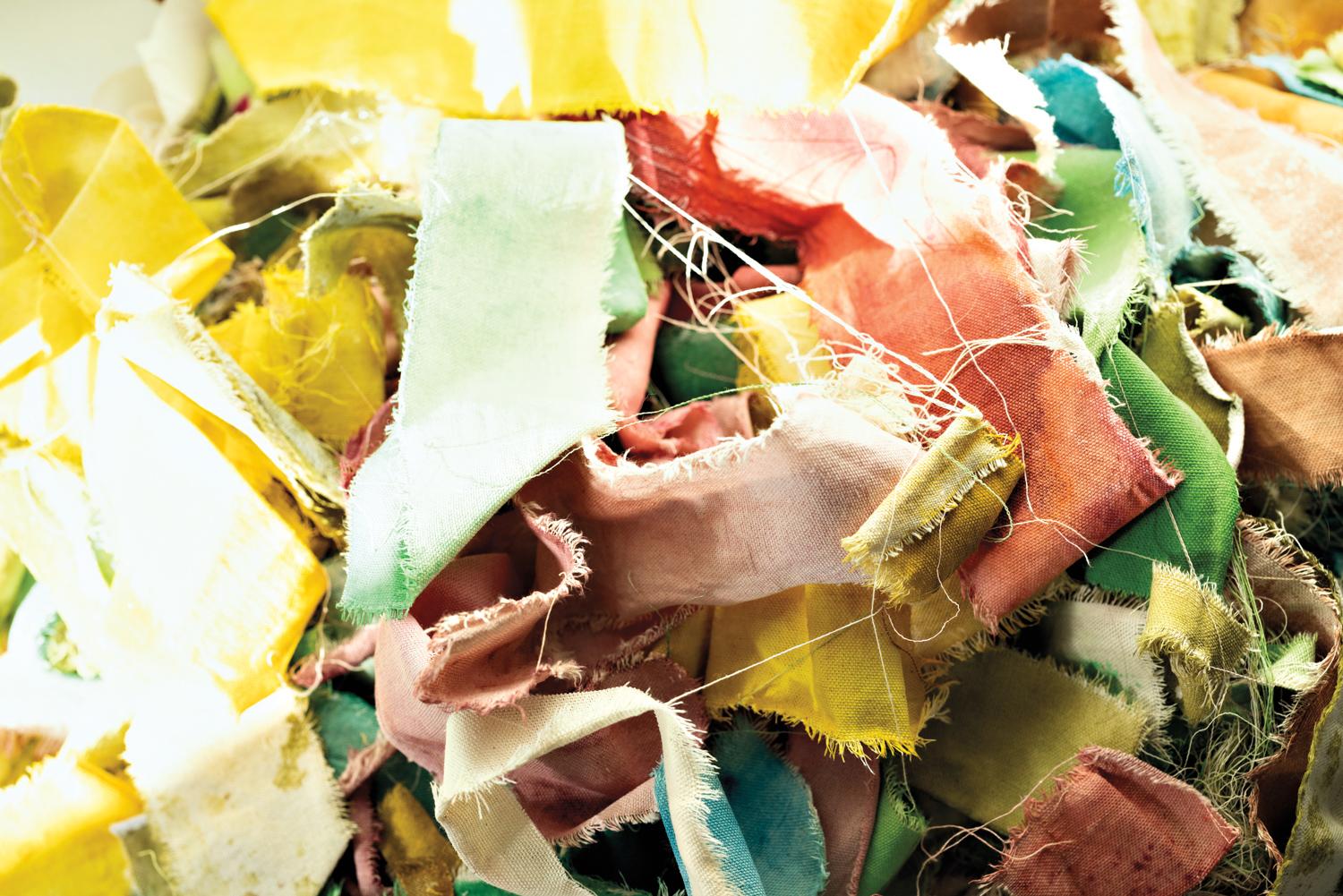 Piles of dyed fabric scraps