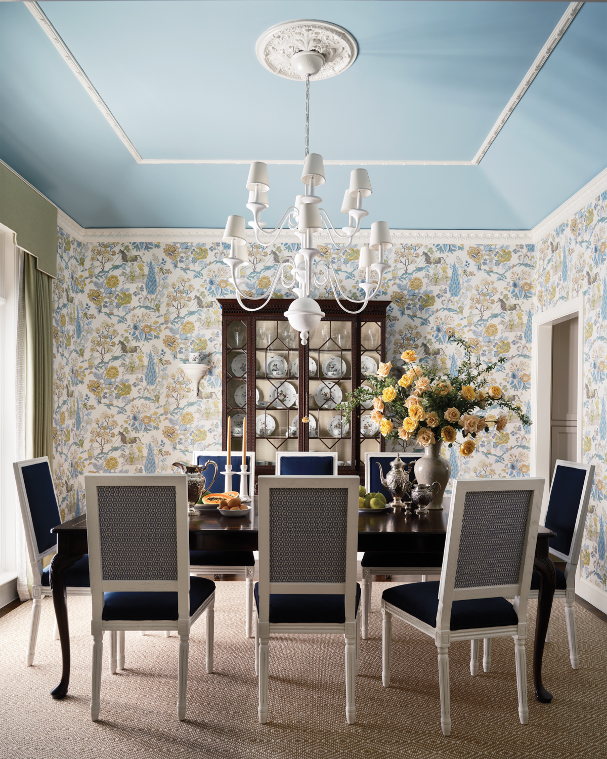 Dining room with blue ceiling...