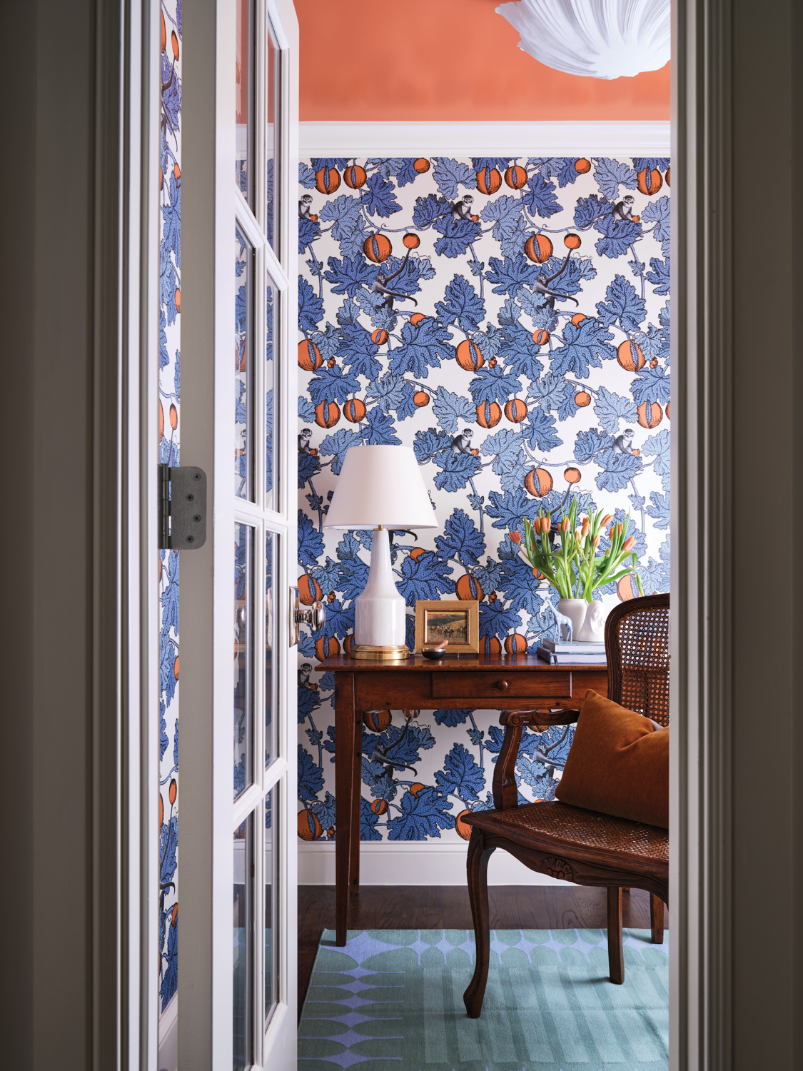 Study with blue floral wallpaper,...
