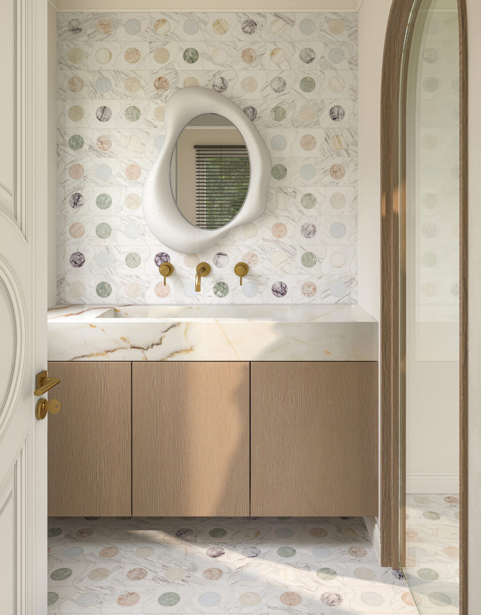 polka dot tile in a bathroom is one of many kitchen and bath trends this spring