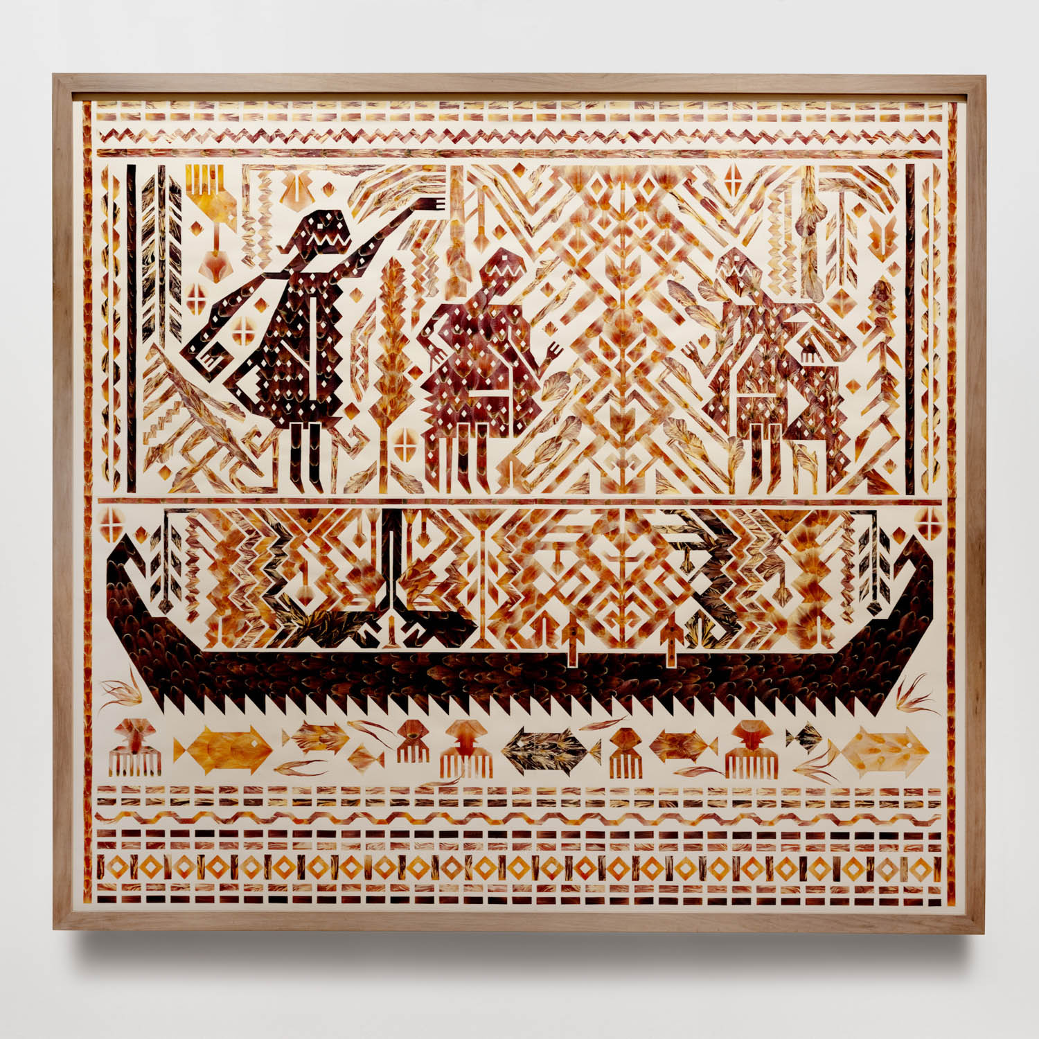 marquetry artwork depicting people atop a mountain