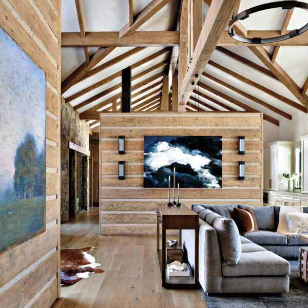 ranch-style great room with high arched ceilings and exposed wooden beams