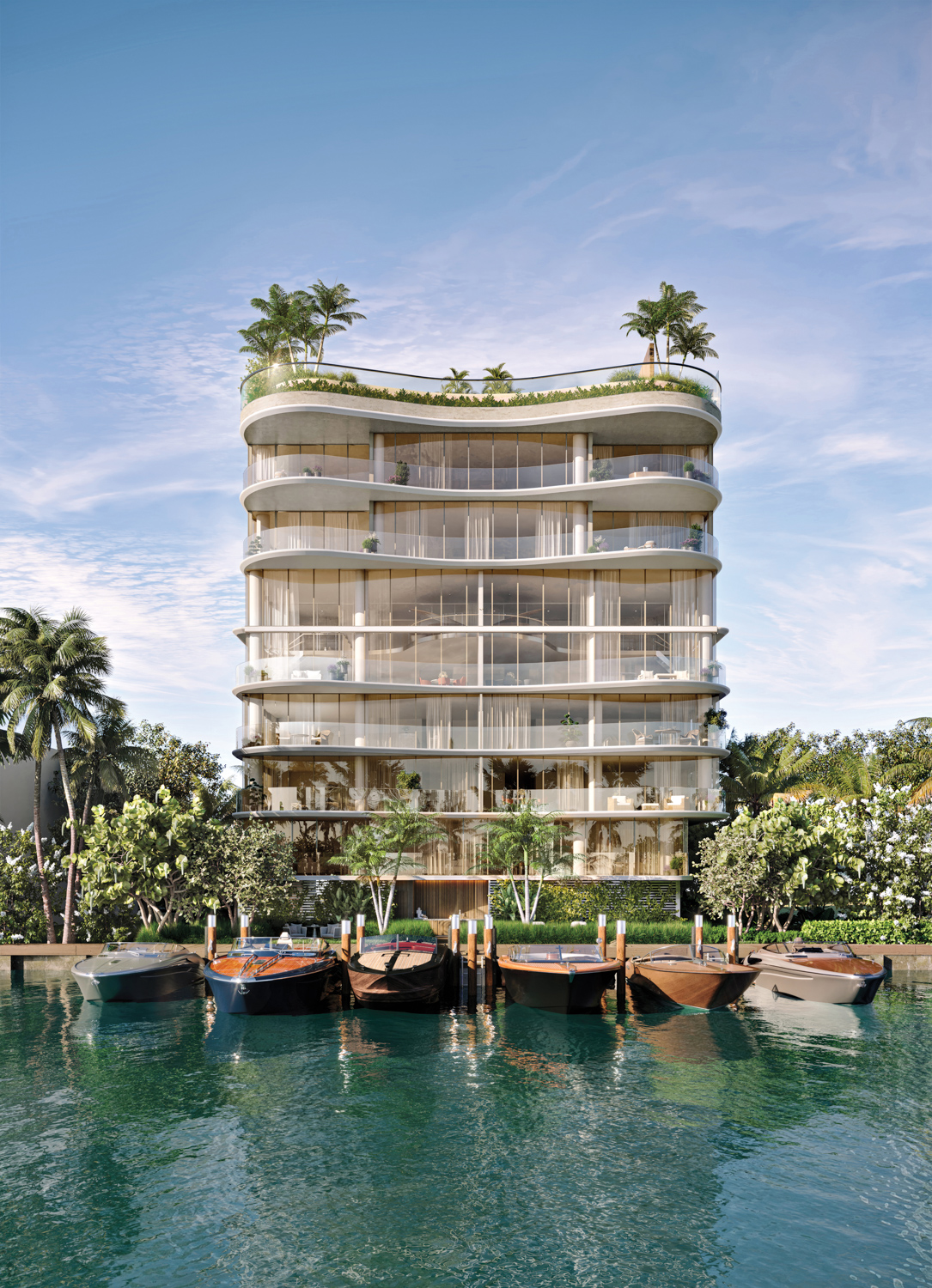 waterfront 8-story condo building with soft curved balconies framed with lush greenery