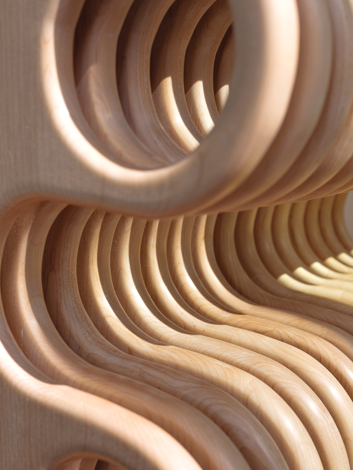 curved detail on a piece of wooden furniture