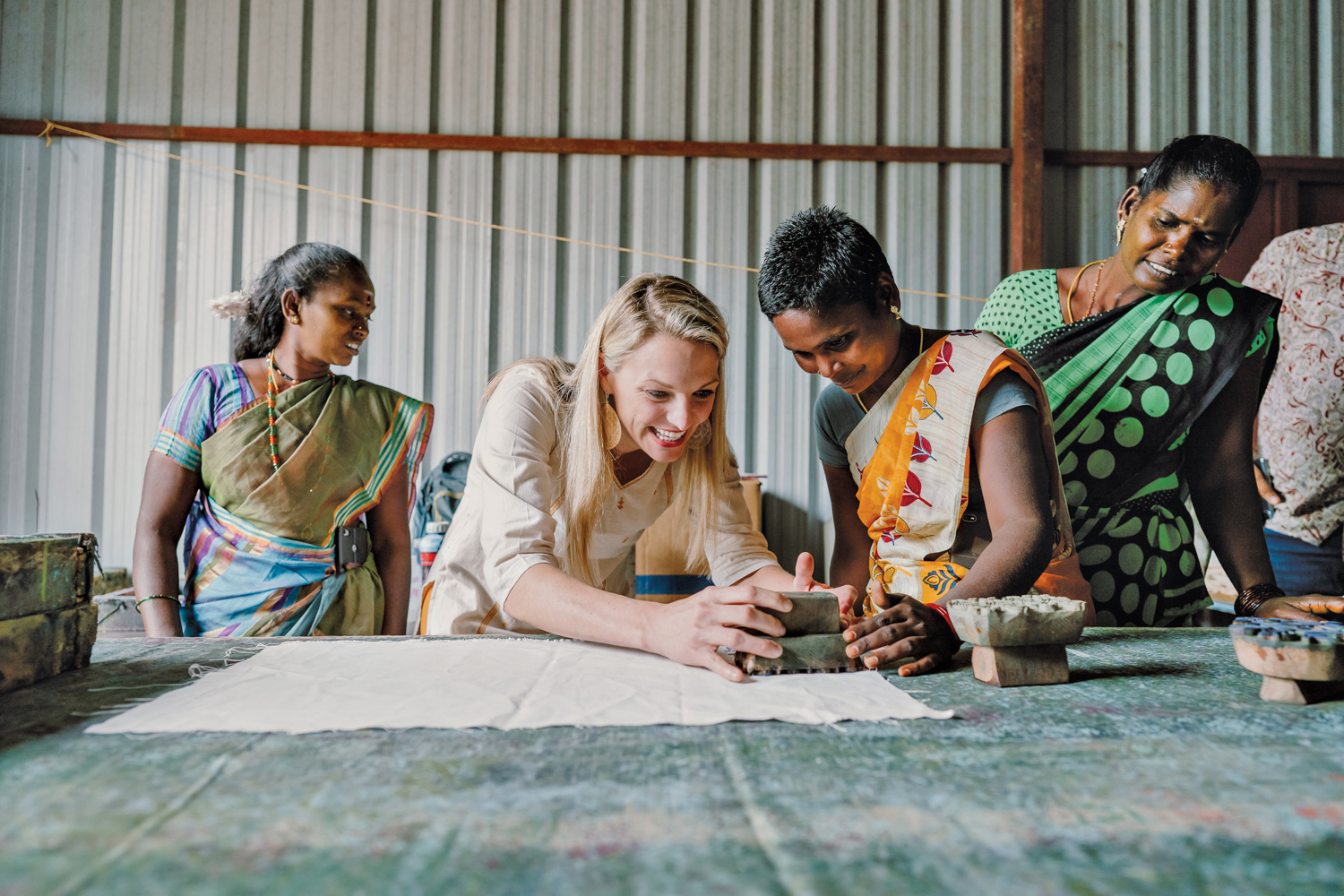 Mallory Matrin wood-block printing textiles with modern-day slavery survivors in South Asia