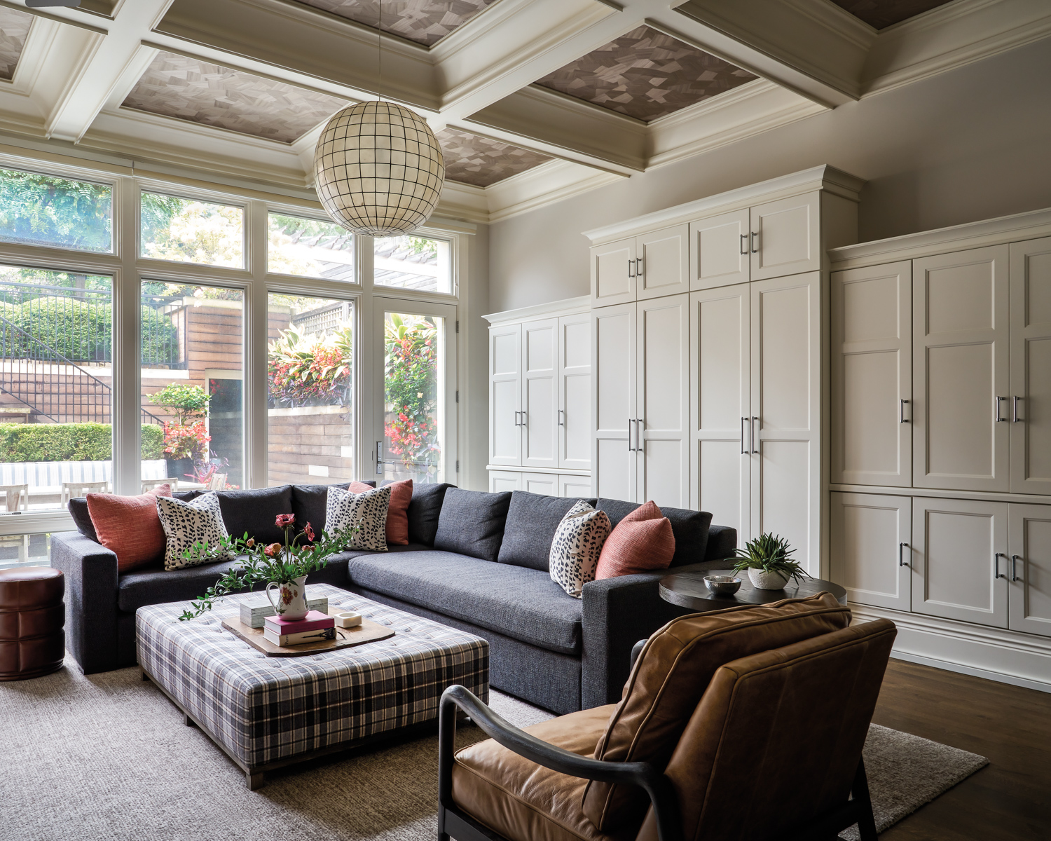 family room with taupe walls,...