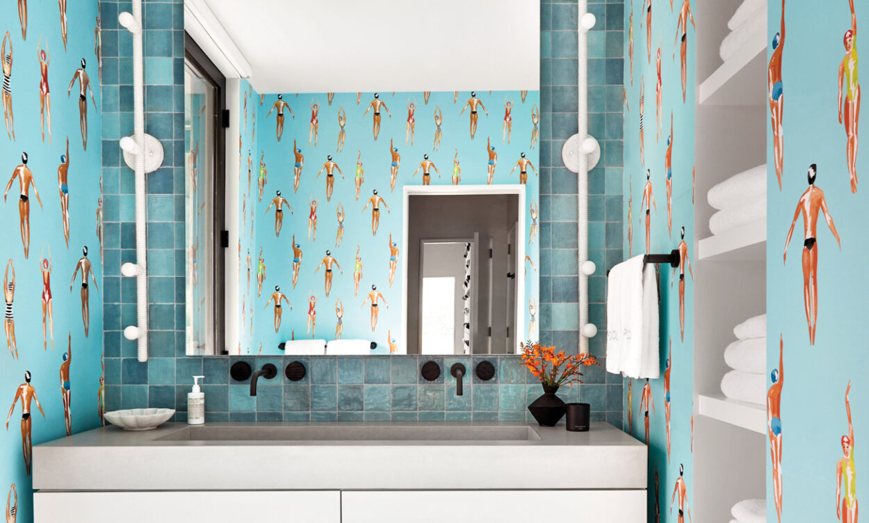 Quirky Wallpaper Envelops This Playful Pool House Bathroom
