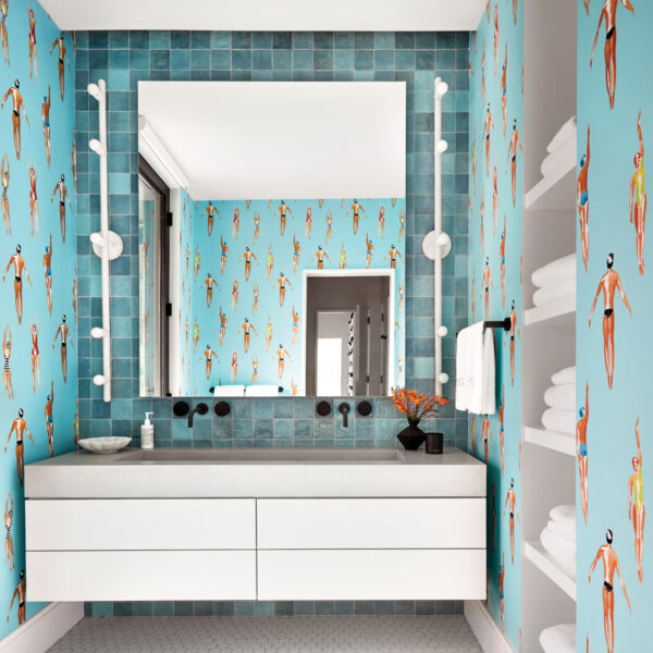 Quirky Wallpaper Envelops This Playful Pool House Bathroom